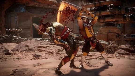 In-game footage from a Mortal Kombat fight between Raiden and Scorpion